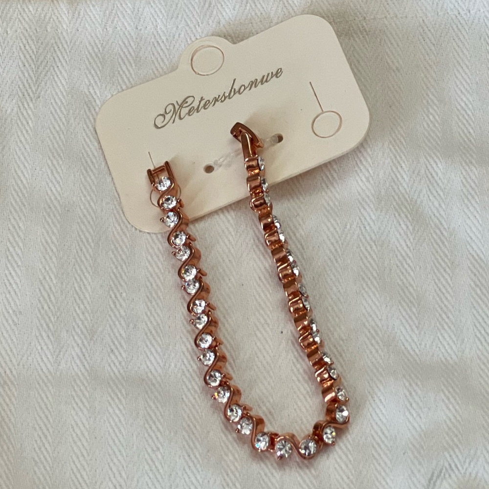 Swarovski rose gold toned bracelet.